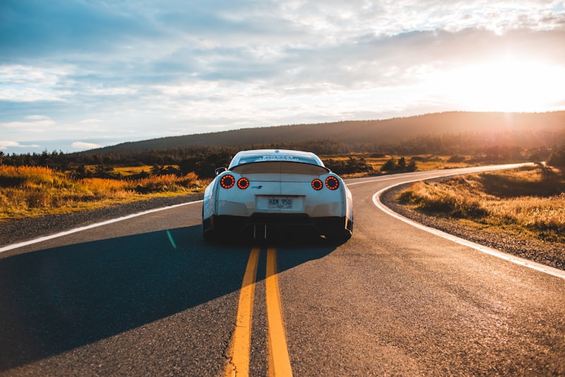 Car on a road representing automotive consumer education